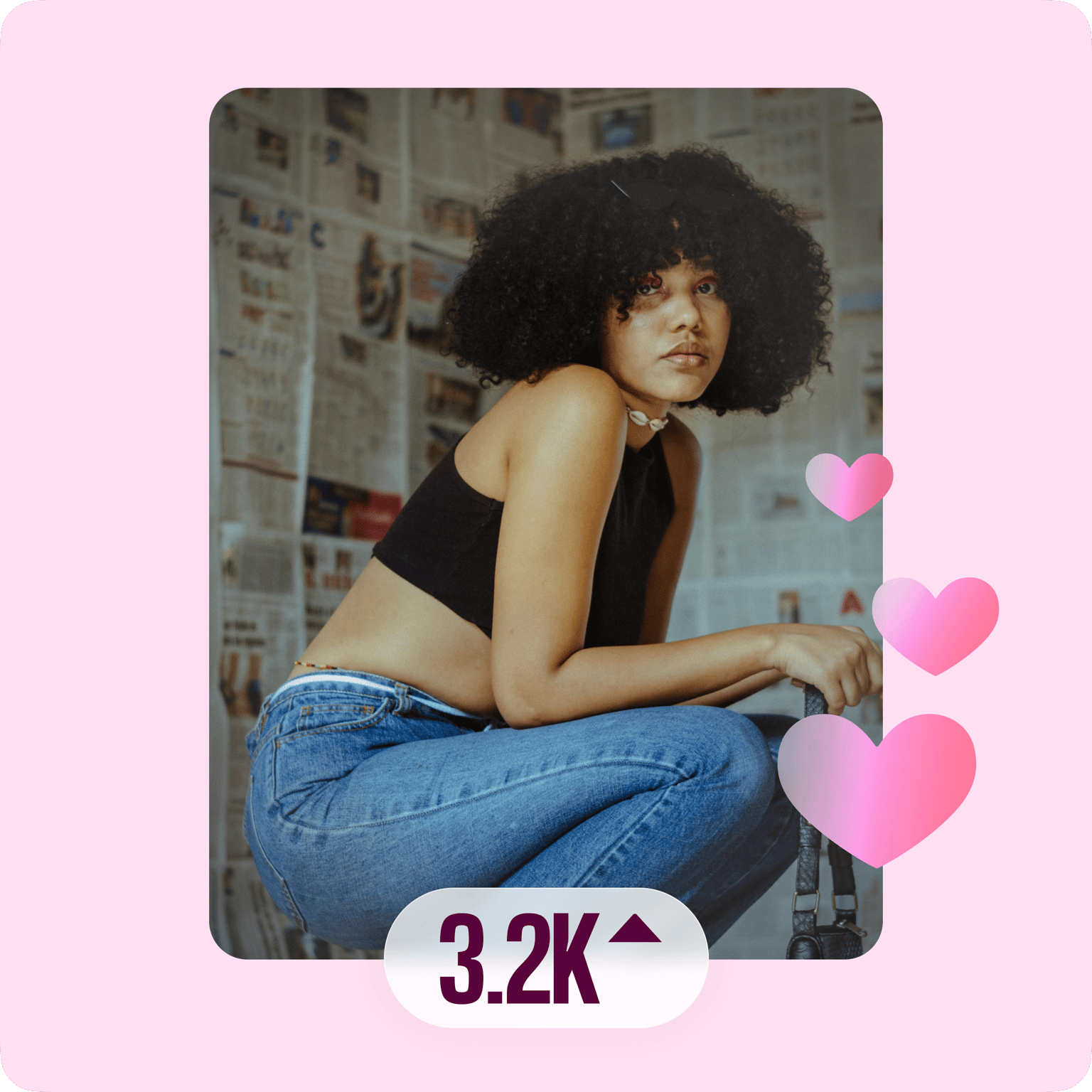 Woman with afro displaying 3.2K engagement with pink hearts, illustrating social media content growth potential.