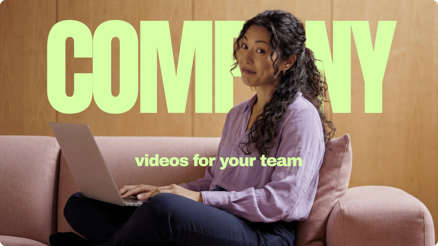 Person using a laptop as onboarding video maker creates company onboarding videos for a team