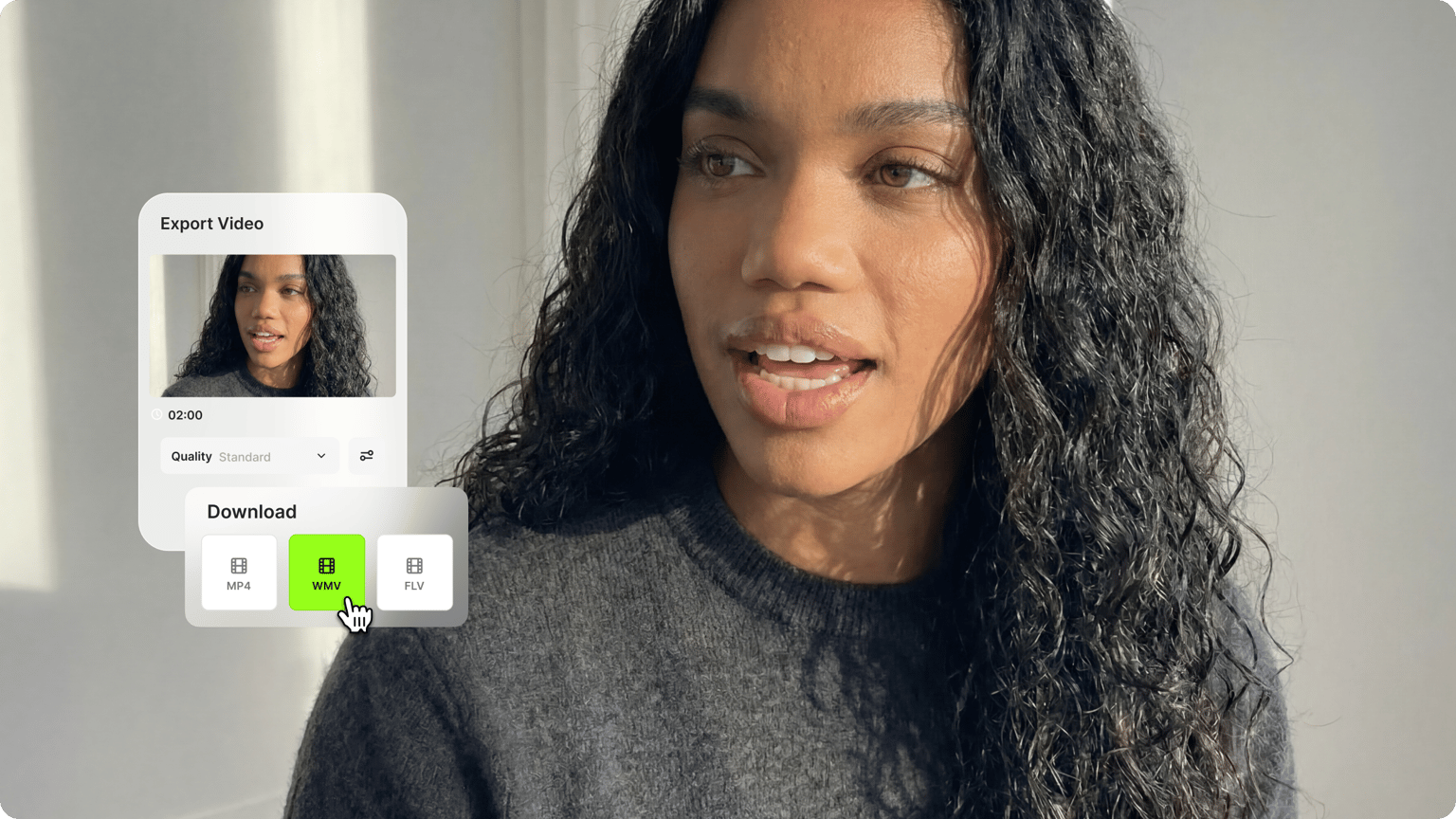Woman with curly hair exporting a standard quality video choosing the green WMV download button option.